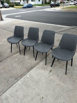Brand new set of four gray dining chairs for 120