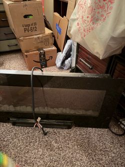 Fireplace /w diamonds plug in heater.
