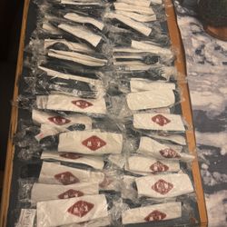 63 Sealed Sets Of Disposable Black Cutlery Spoon Knife Fork with Napkin 