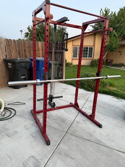 Power rack with bench/bar and cable attachment