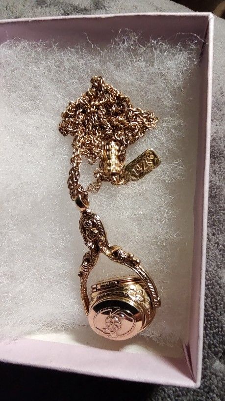 1928 3 Sided Spinning Locket
