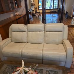 Cream leather couch. 3 seat.