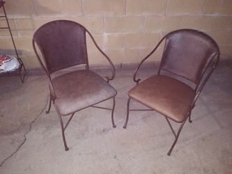 2 cast iron chair s and one counter stool