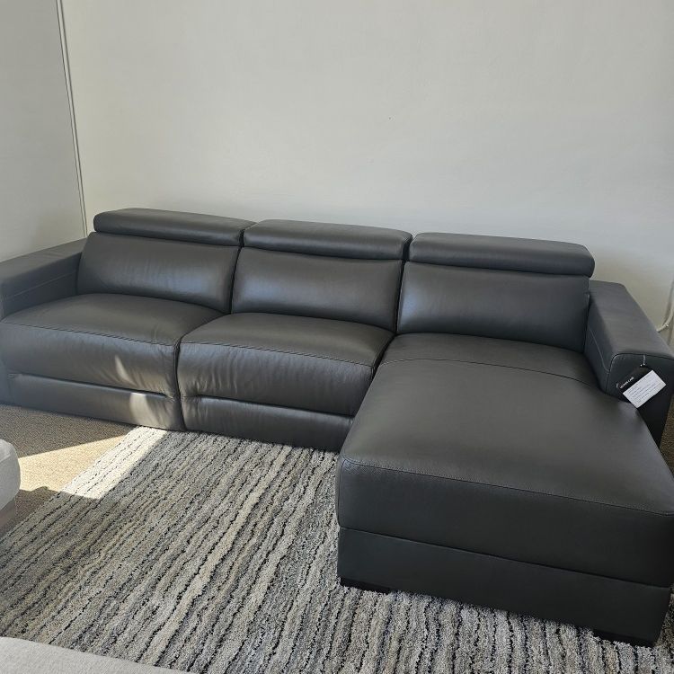 Heavily Discounted 3-pc Sectional Sofa With a Chaise and a Recliner. Nevio 3-pc 100%Leather 