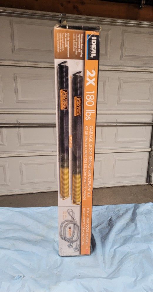 BRAND NEW GARAGE DOOR SPRINGS REPLACEMENT KIT. $60.00 OR BEST OFFER. LOCAL PICK UP ONLY.