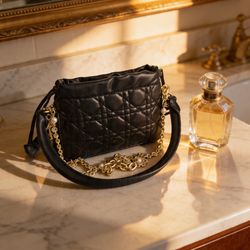 Small leather bag on black