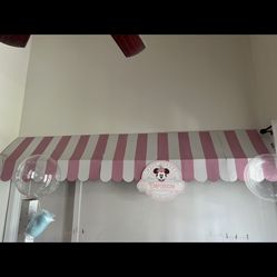 Emporium pink and white inning and sign Disneyland pastel party