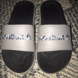 Grey Reebok Slides