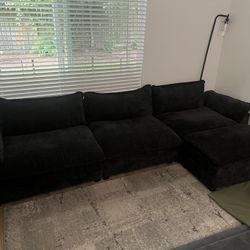 Black sectional Couch + Ottoman 