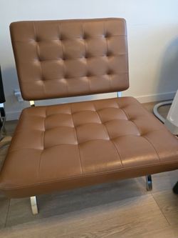 Brown Leather chair with foot rest