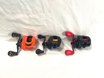 Brand new never used Lew’s and Abu Garcia medium action bait, caster fishing reels. The orange one retails for $90.