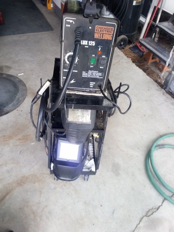 Wire Feed Welder With Cart And Two Helmets