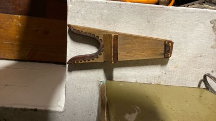 vintage wooden boot jack featuring an advertisement for Clark Feeds & Western Store in Paramount, CA.