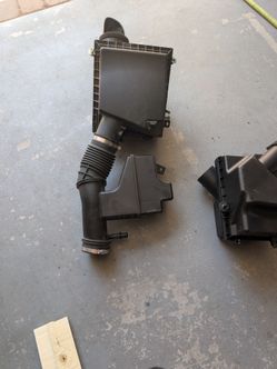 2016-2023 tacoma air intake box with intake hose.