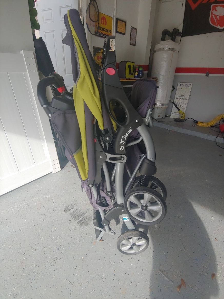 Double stroller with stand board