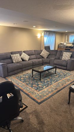 L Shaped Sofa With Motorized Recliners In excellent Condition.