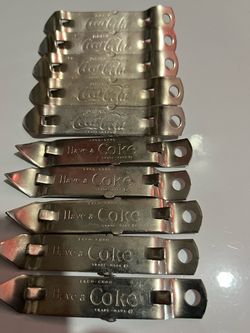 Coca-Cola 10 NOS bottle or can openers as found in old Coca-Cola executives collection