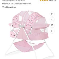 Bassinet + Baby Clothing 