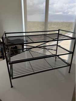 Wire shoe rack - 9 pair, $20