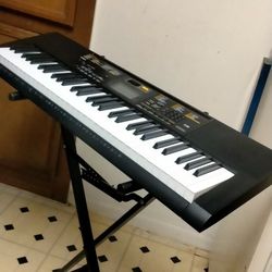 61 Key Casio Piano Keyboard With Cord And Stand. In New Condition 