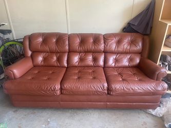 Vintage tufted leather couch