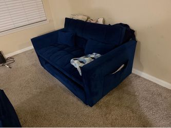 Blue couch open up