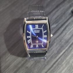 RARE Never Worn Mens Tank Barrel Blue Satin Roman Dial Black Leather band Seiko Watch
