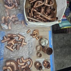 Bin Filled With Copper Pluming Fittings 