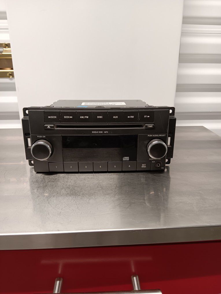 Jeep Dodge Chrysler Radio CD Player Stereo Aux MP3 P0(contact info removed)AC OEM 2007-2017
