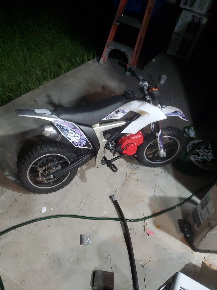 Mini Dirt Bike For Kids Having New Motor In Hand