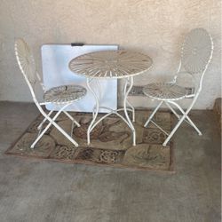 round table with 2 chairs 