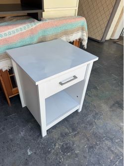 White wooden bedside / nightstand with drawer