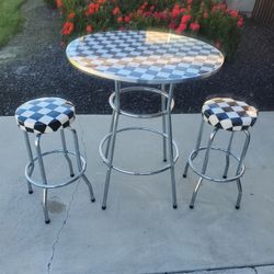 Dinner table and stools