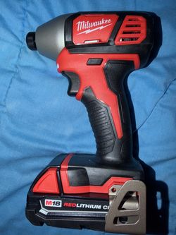 MILWAUKEE IMPACT AND BATTERY M18