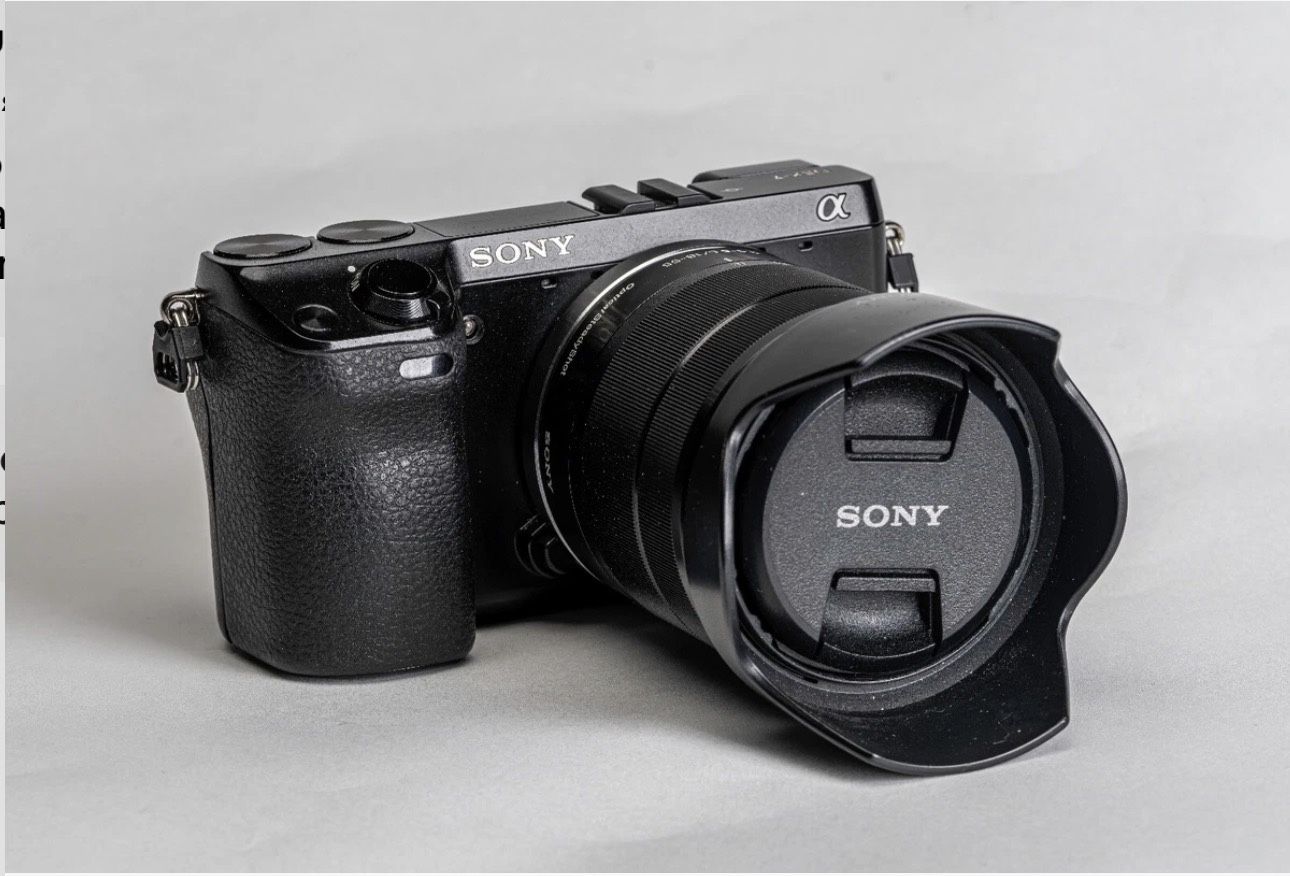 Sony Alpha Nex-7K 24.3MP Digital camera Black With Lens, Backpack, And SD CARD