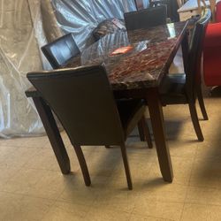 Table and four chairs 799