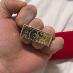 100 bill, 10k gold 6.6 grams dimond cut