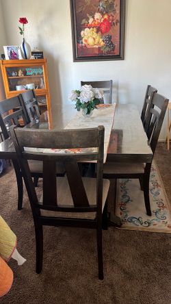 8 chairs, extra leaf dining table