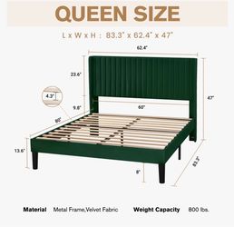 Green velvet upholstered bed frame and mattress