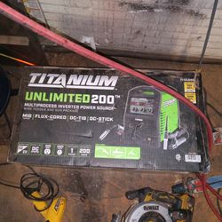 Brand new titanium unlimited 200 welder.Multi purpose gun package