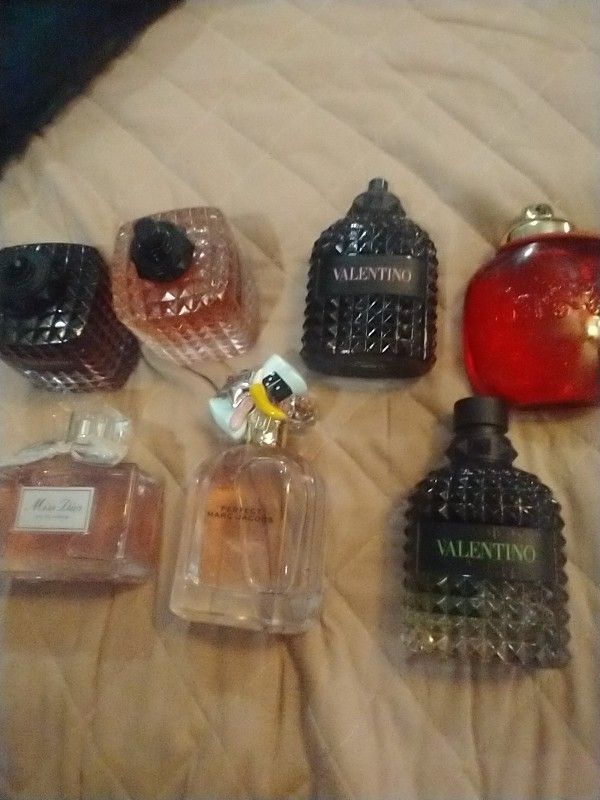 Women And Men Perfumes.