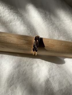 10 karat Gentlemens band ring 6 mm wide .03 carat total weight channel set diamonds