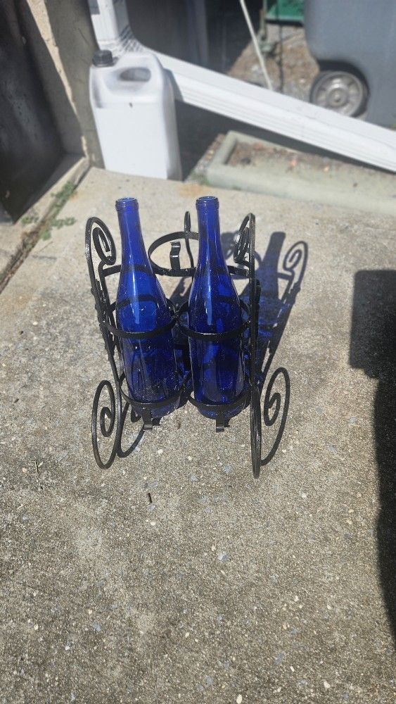 Cast iron wine bottle holder