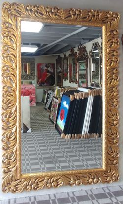 Antique frames and mirror.