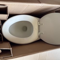 White Elongated Toilets X 2