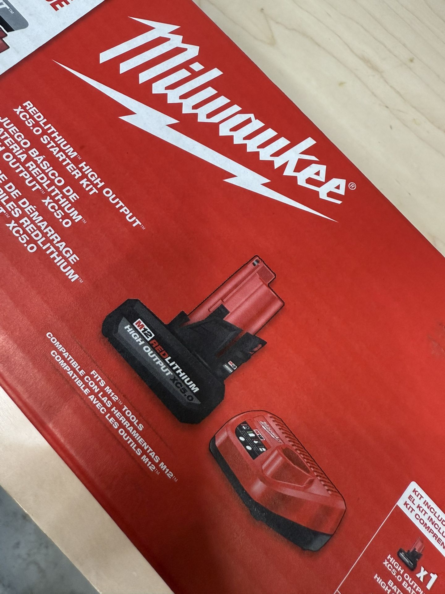Milwaukee m12 high output battery and charger new in box
