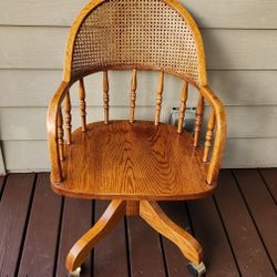Vintage Cane Back Wood Swivel Bankers Chair Mounted On Casters 36-5/8" Tall Home And Office Furniture.