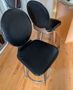 Metal and black vinyl bar stools - set of 2