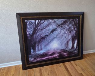 This framed artwork is "Evergreen Plantation" by artist Mike Jones