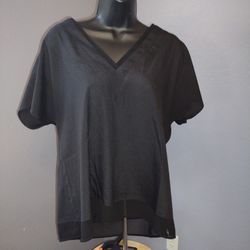 DKNY Women's Short Sleeve Black Blouse Size Large With Sheer Bottom Strip
100% polyester 
